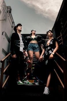Three fashionable models pose confidently on a staircase in San Andrés Cholula, Mexico.