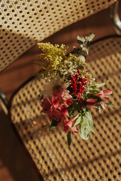 A flower arrangement on a chair in a room