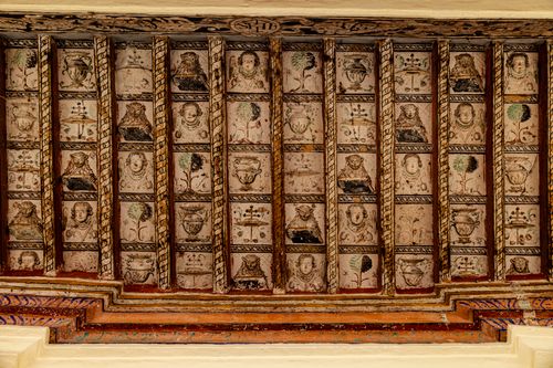 Free Detailed view of a historic painted ceiling with intricate designs in Cusco, Peru. Stock Photo
