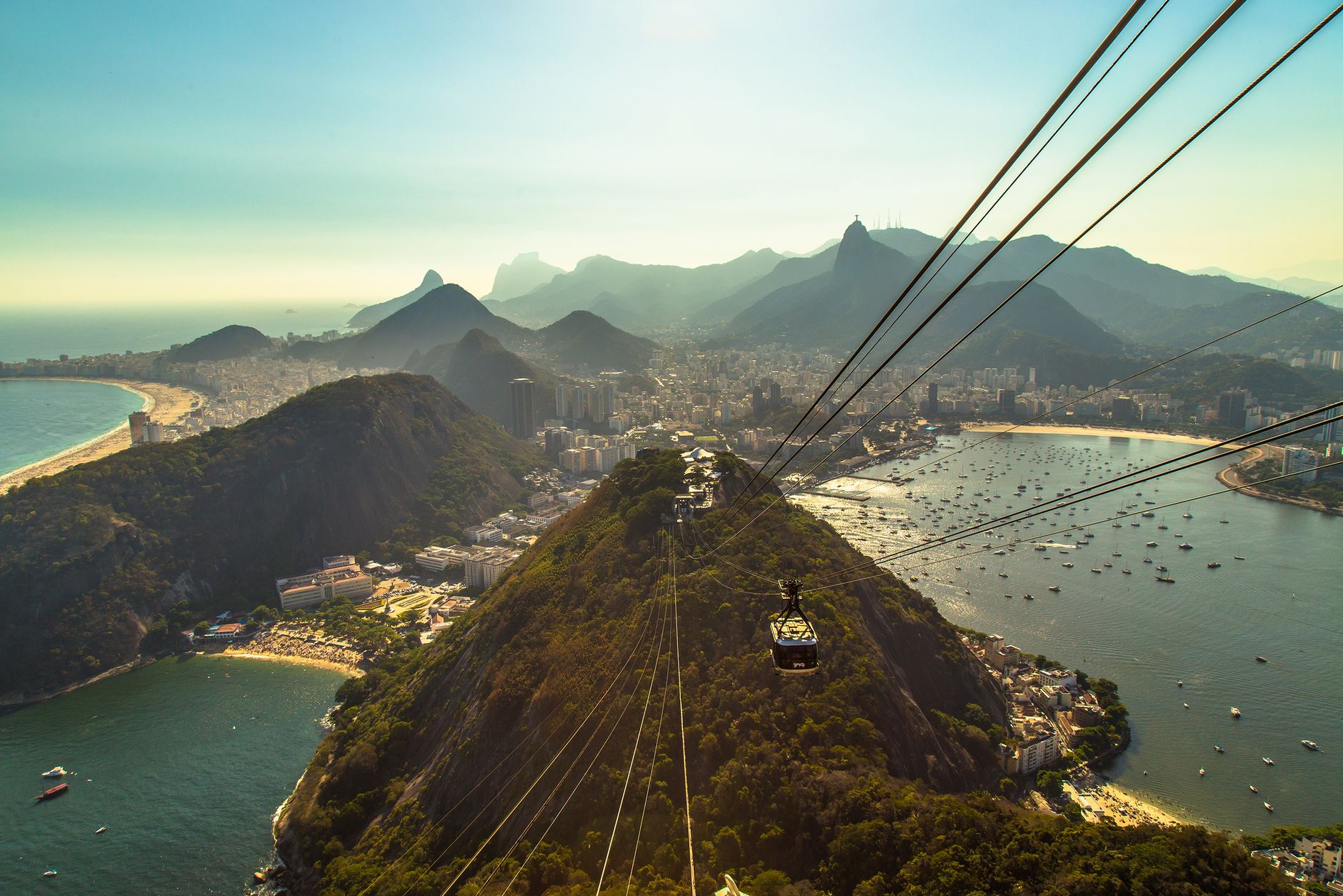 sugarloaf mountain pao de acucar rio de janeiro brazil cable car guanabara bay sunset