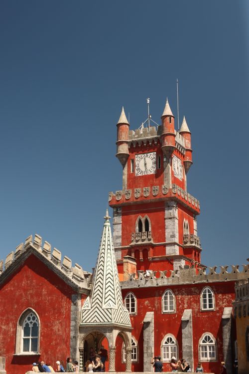Free Vibrant shot of the iconic tower at Pena Palace in Sintra, Portugal. Stock Photo