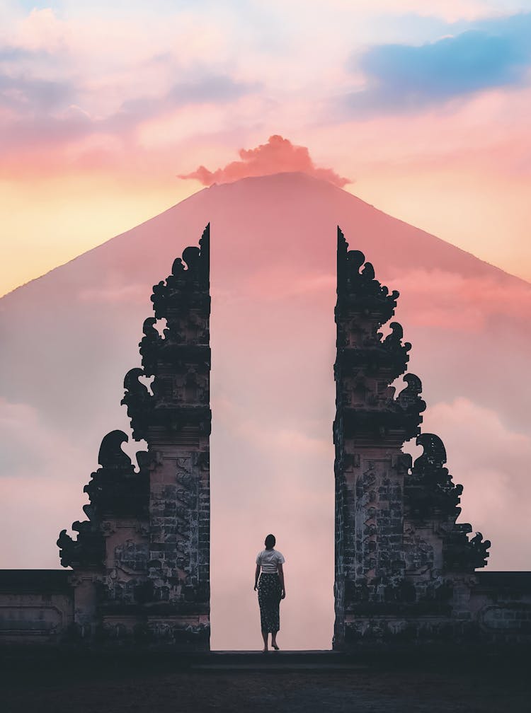 Photo Of Person Standing On A Famous Temple