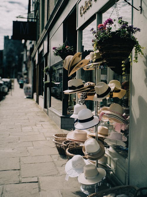 Free stock photo of hats, high street, shop