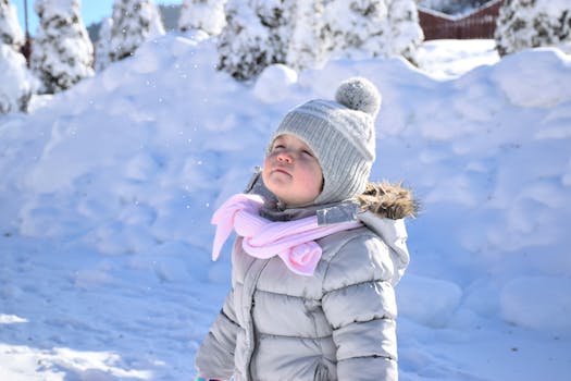 Toddler Walking on Snow