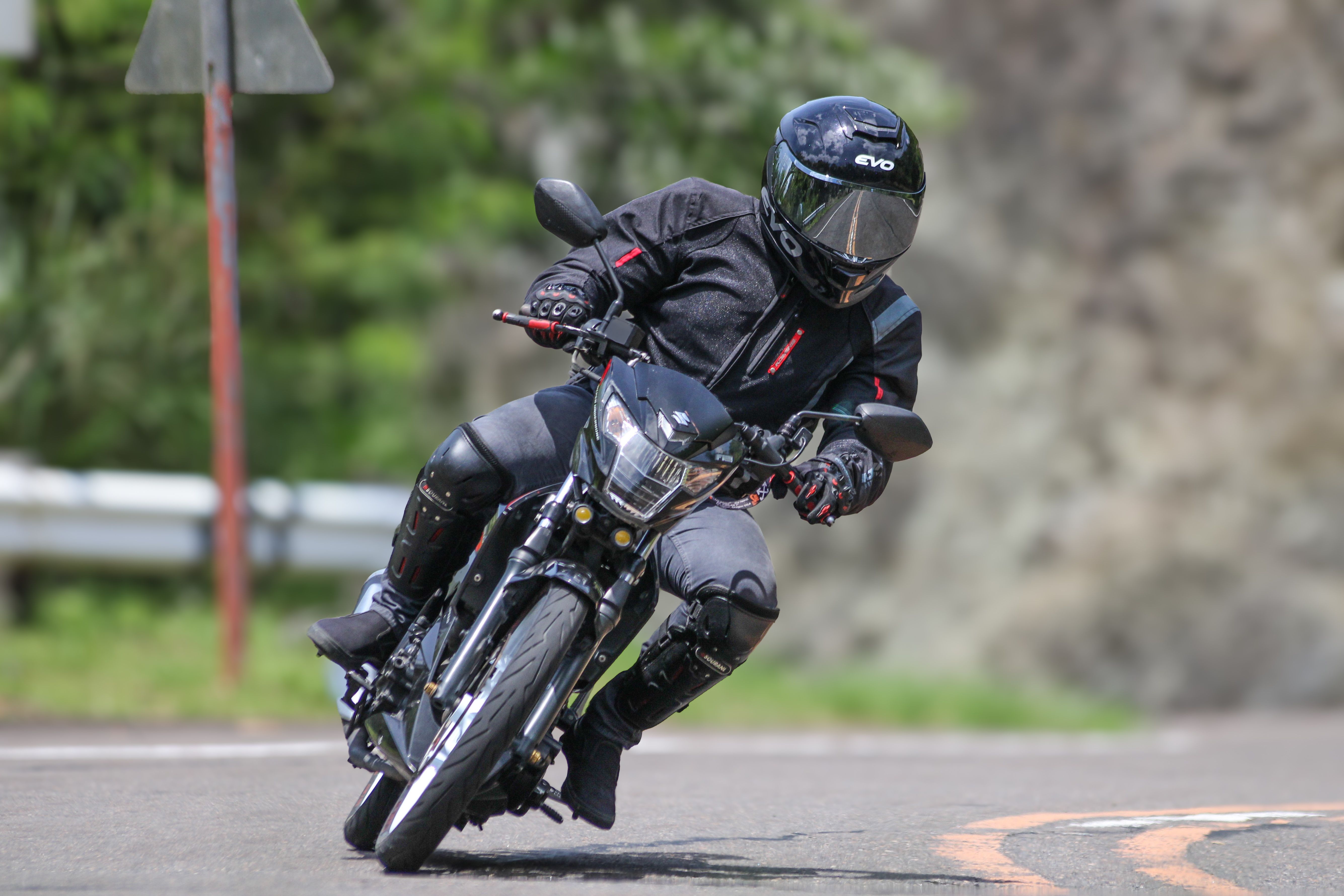 Rider Taking a Bend · Free Stock Photo