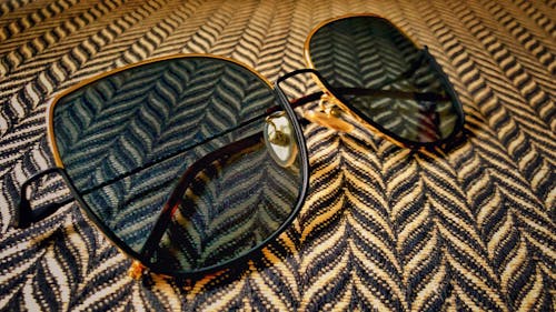 Free stock photo of black, colorful sunglasses, eyewear