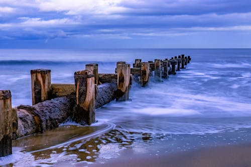 A long exposure photograph of a wooden pier