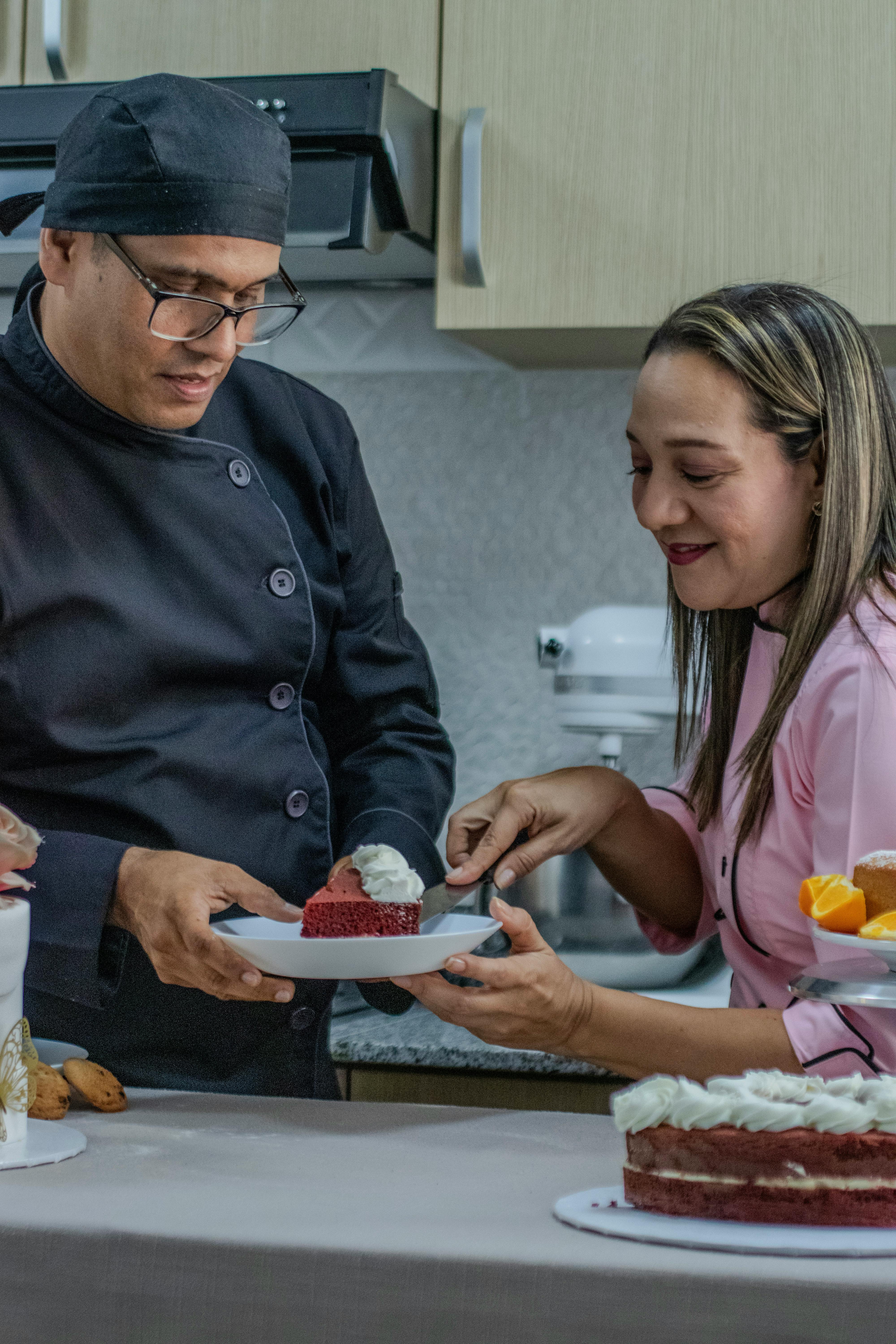 two people in a kitchen