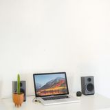 Laptop on a working desk — photo by San Engineer on Pexels