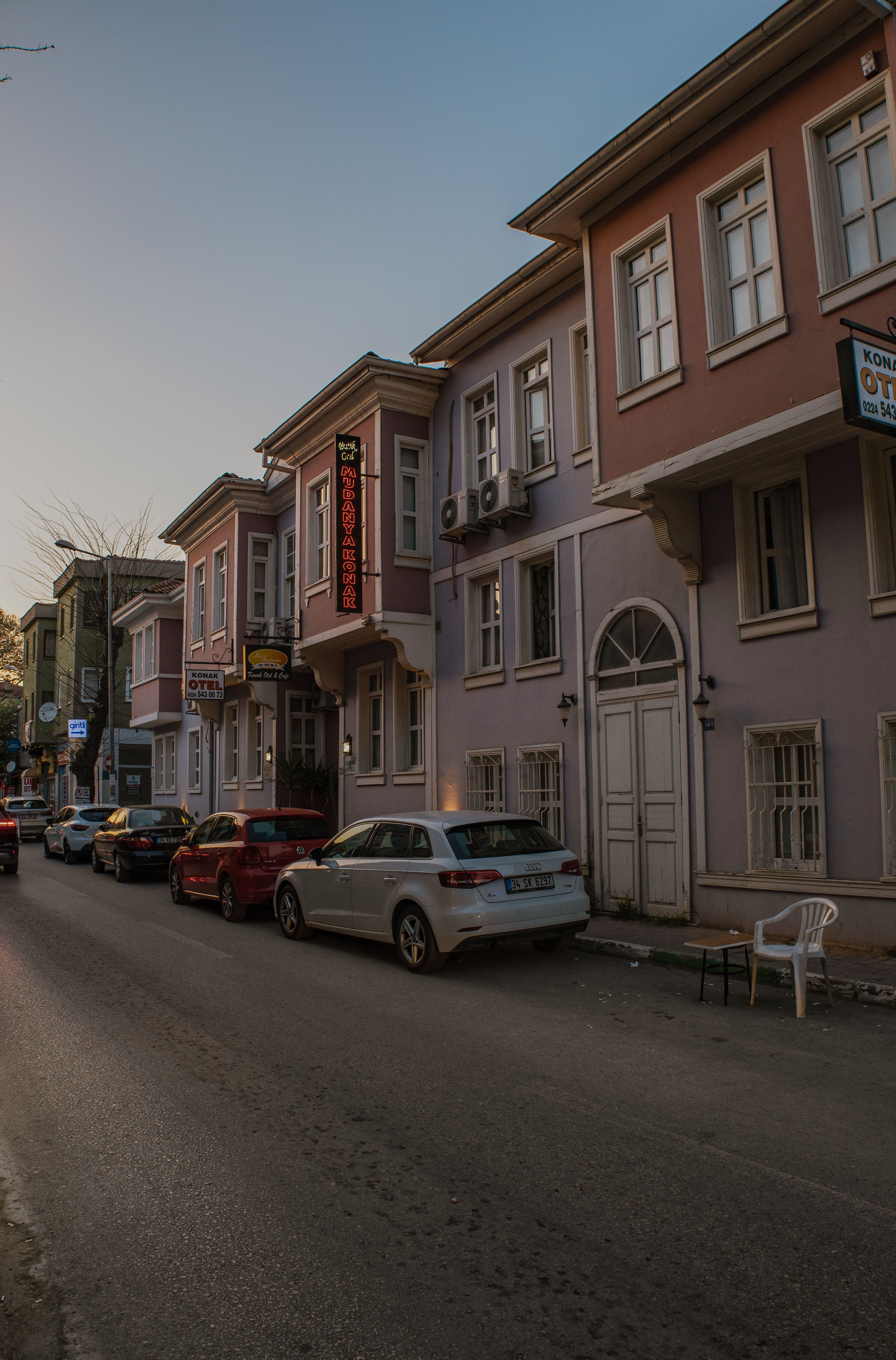 Cars Parked near Houses on Street in Town · Free Stock Photo
