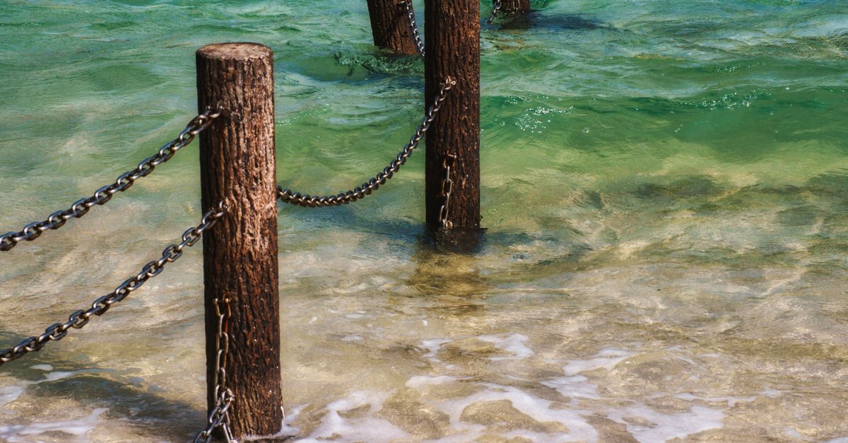 Chain Between Two Posts Pinterest Wooden Posts with Chains on Sea Shore · Free Stock Photo