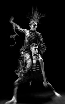 Artistic black and white dance portrait capturing expressive movement.