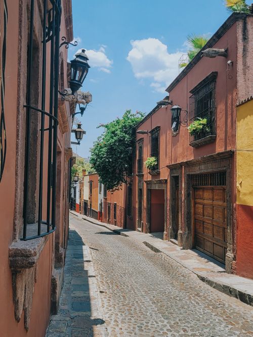 Free Explore the colorful and historic streets of San Miguel de Allende, Mexico, on a sunny day. Stock Photo