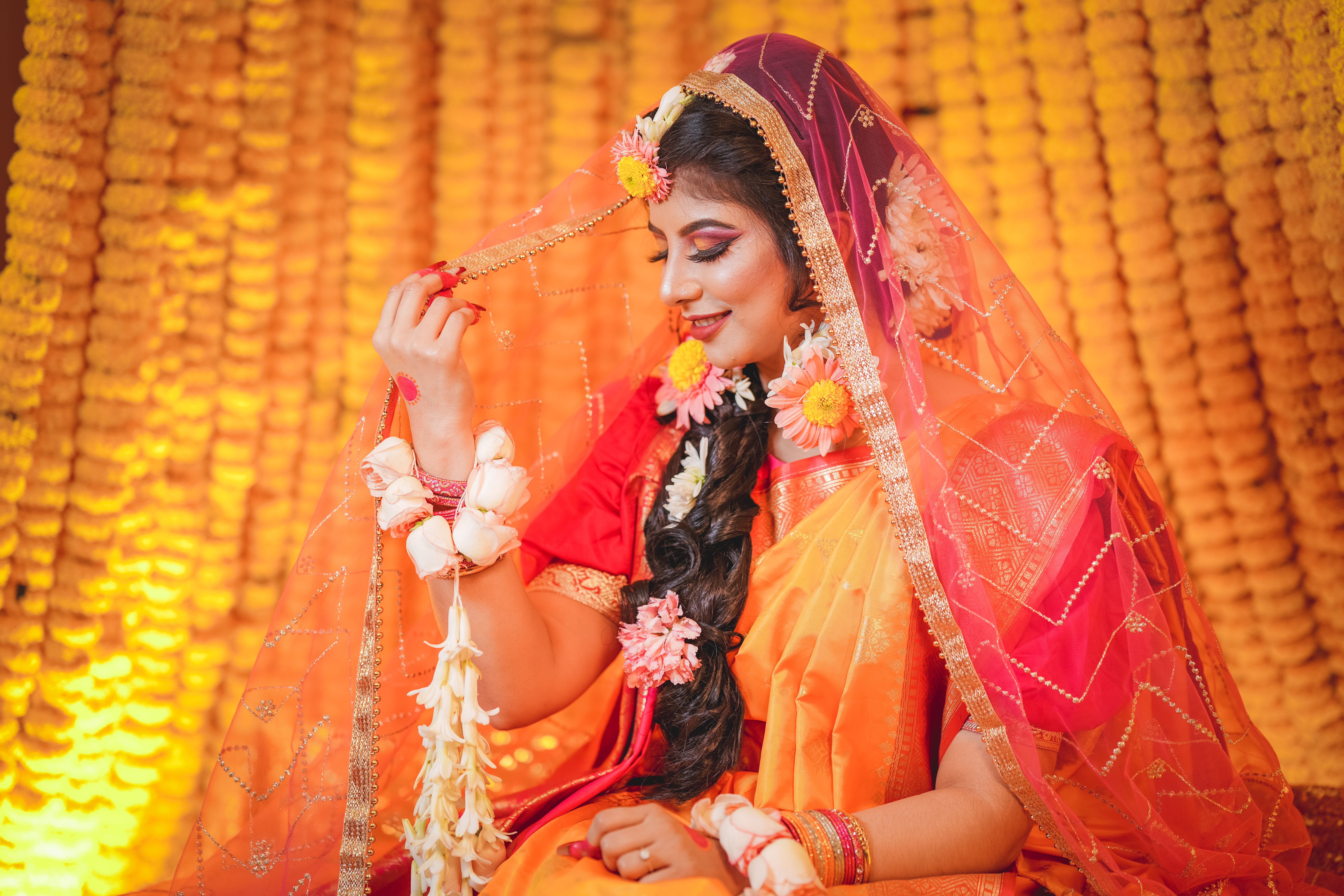 A Woman Sitting in a Traditional Dress · Free Stock Photo