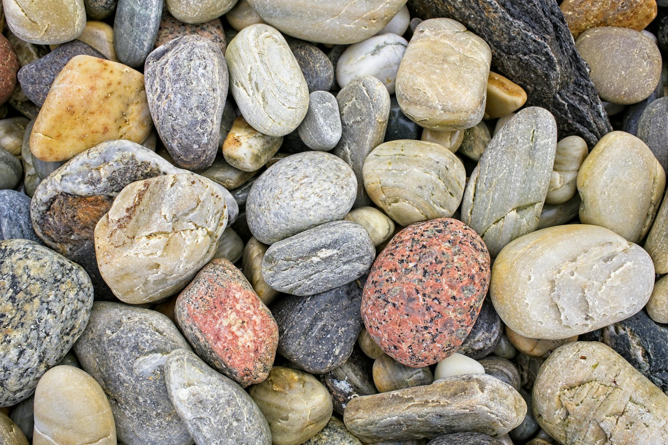 A close up of rocks and pebbles · Free Stock Photo