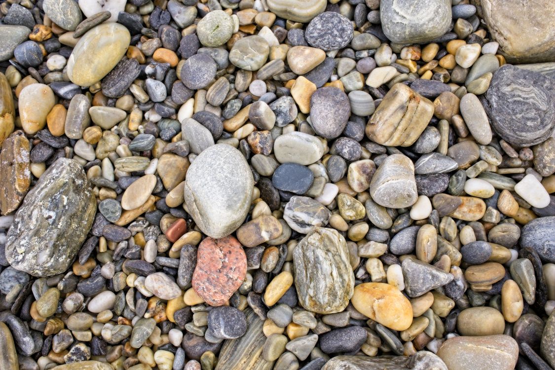 High Rocks Pebbles A close up of rocks and pebbles on the ground · Free Stock Photo