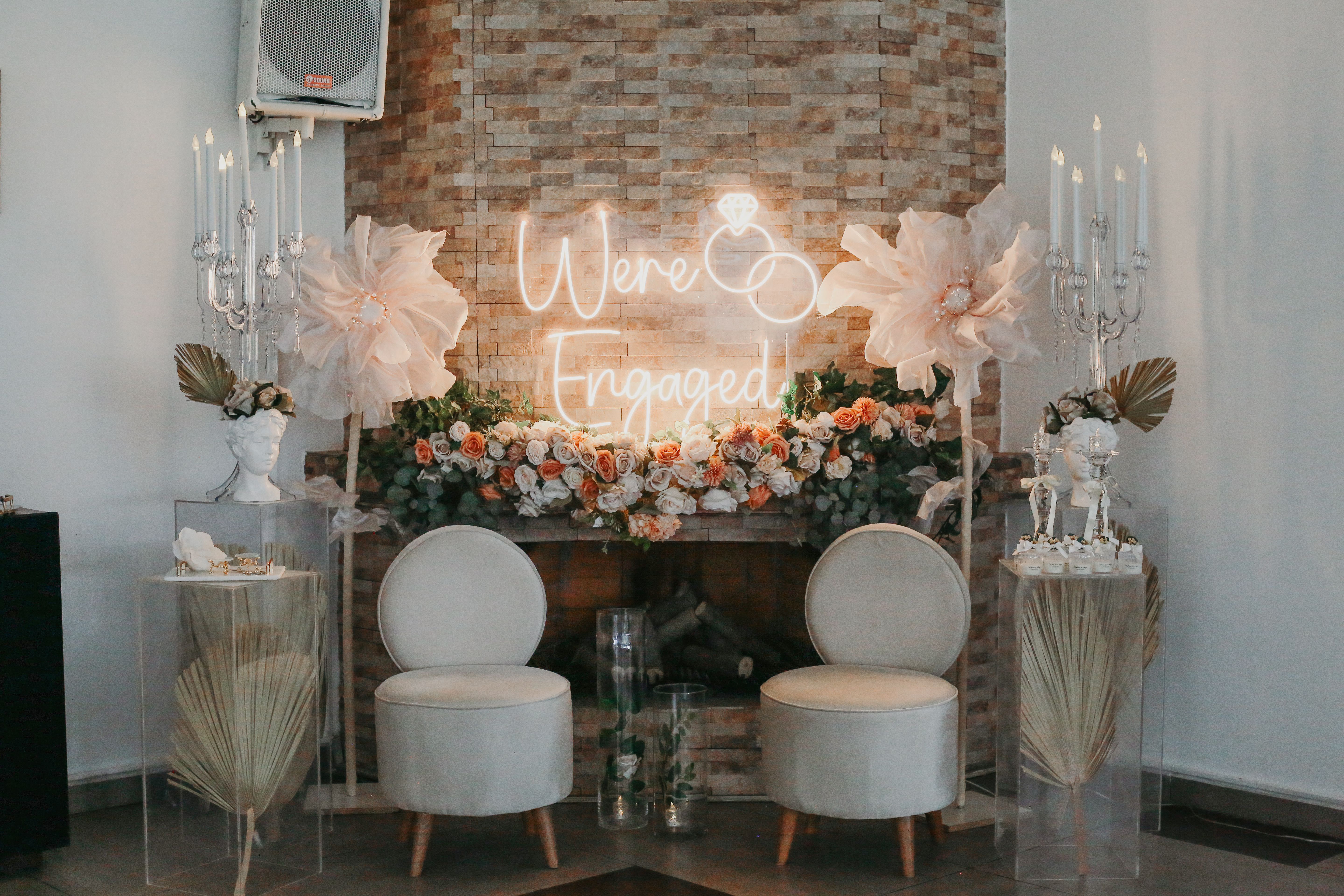 A Neon Sign and Flower Arrangements at a Engagement Party · Free Stock ...