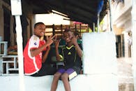 Happy Children Sitting Together Outdoors