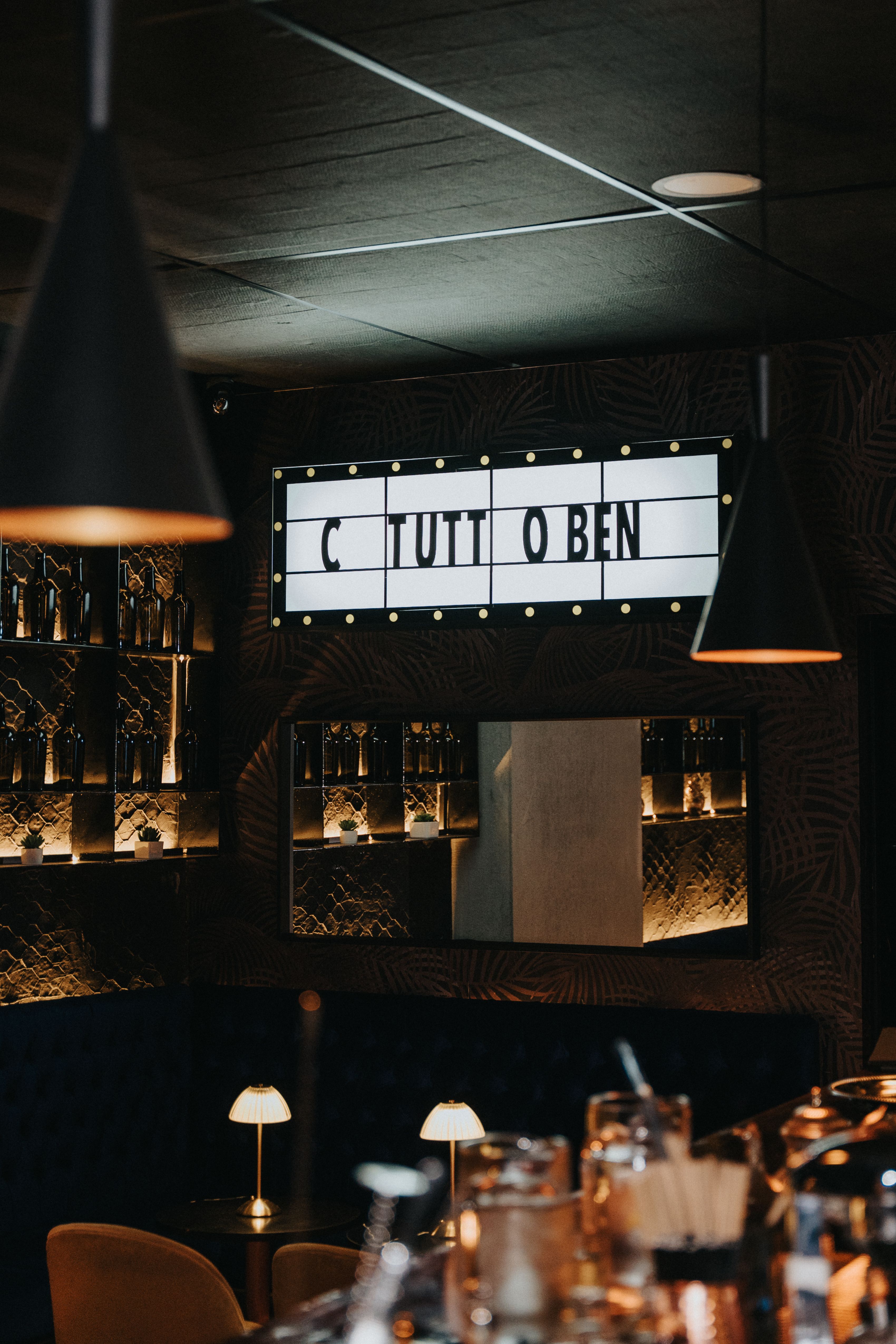 Warm and inviting restaurant interior with atmospheric lighting and decorative elements.
