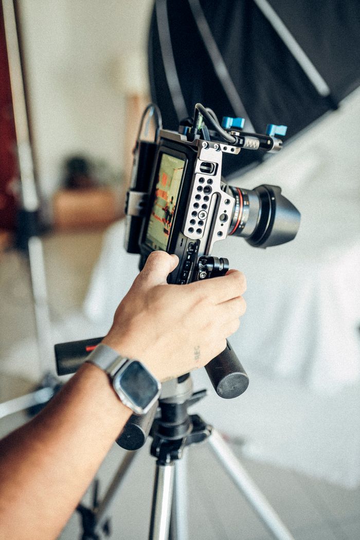 Camera mounted on a tripod in the photography studio