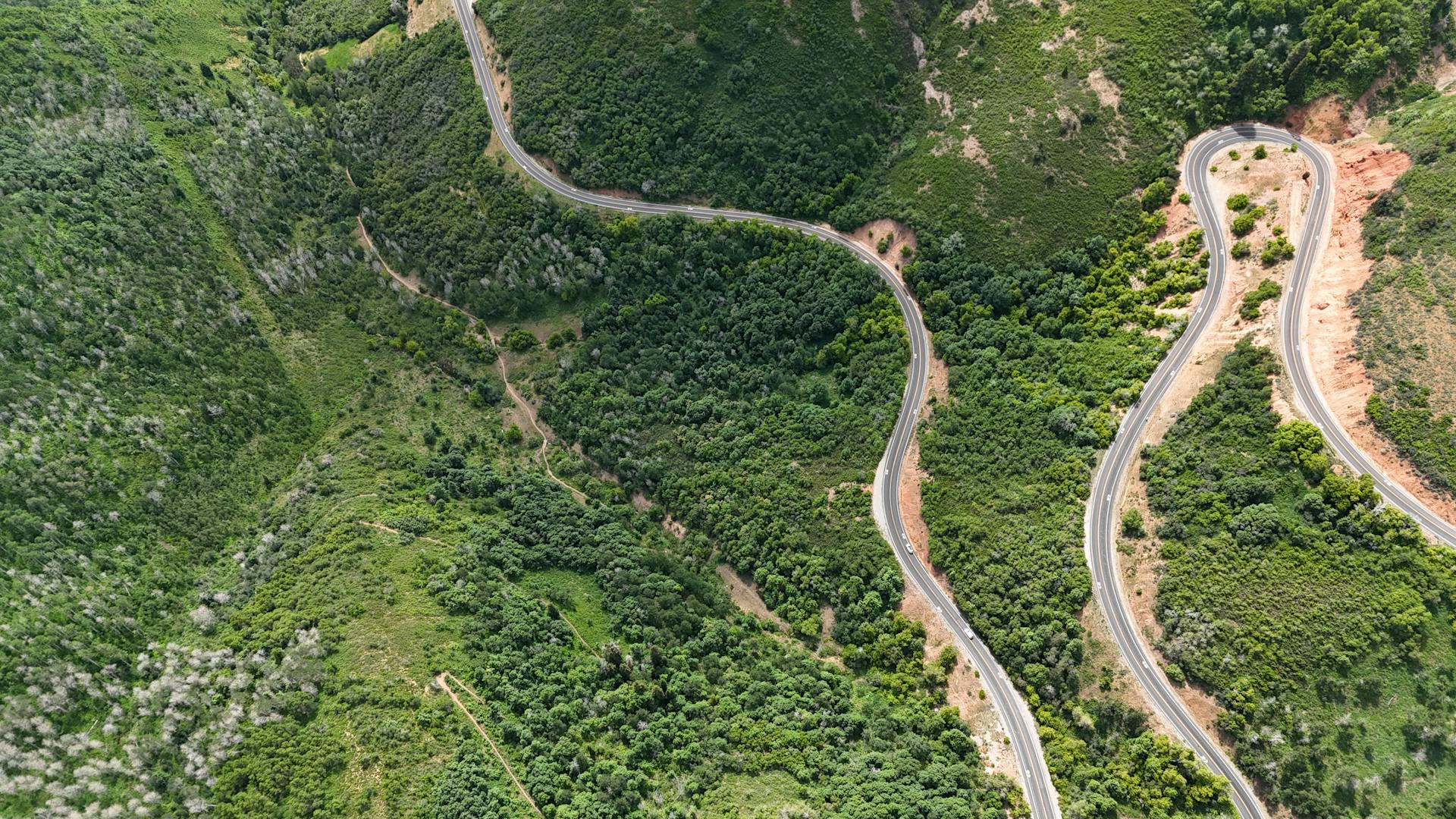 Aerial view of a winding road in the mountains