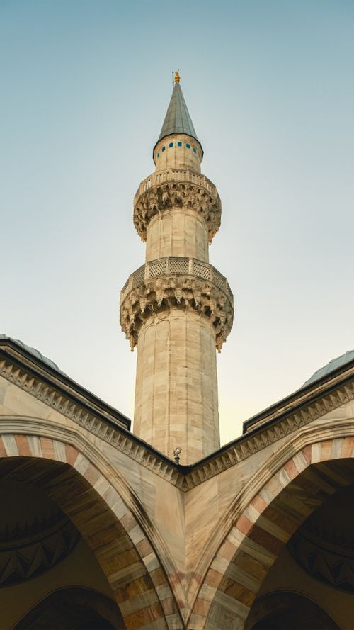 Free A detailed view of the Süleymaniye Mosque minaret in Istanbul, showcasing Ottoman architecture. Stock Photo