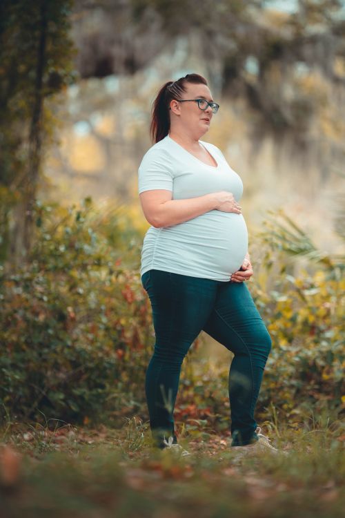 Pregnant Woman in Forest · Free Stock Photo