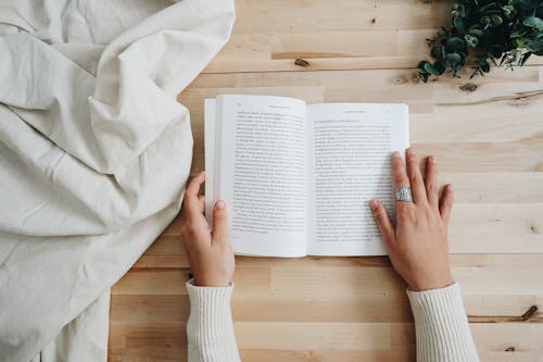 Free Photo of Person Holding a Book Stock Photo