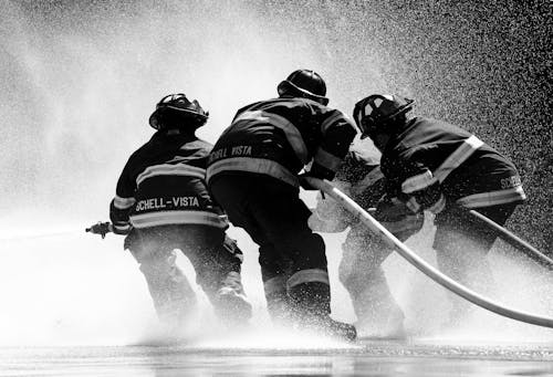 Grayscale Photo of Firemen