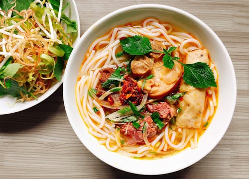 Free Noodles With Meat And Mint On Top Stock Photo