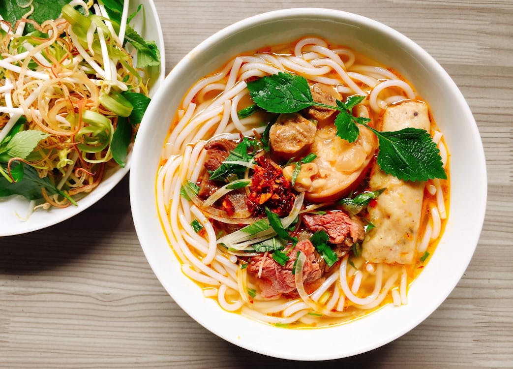 Free Noodles With Meat And Mint On Top Stock Photo
