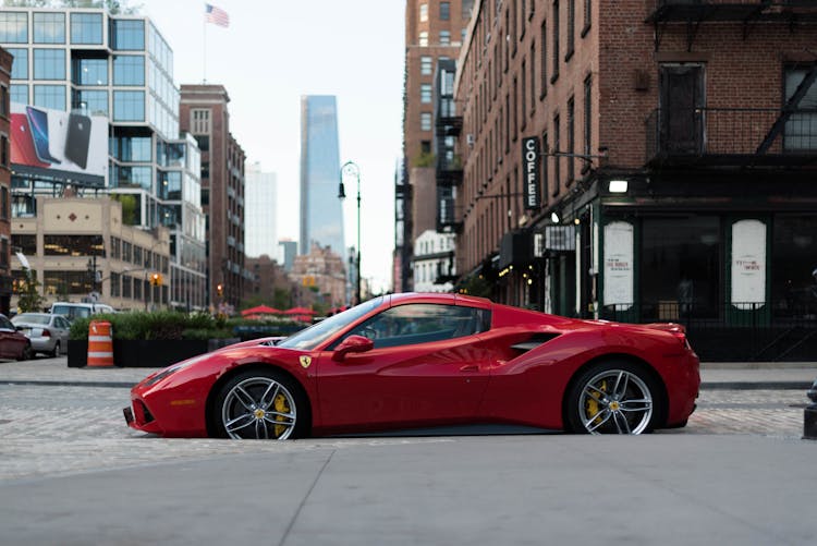 Photo Of Ferrari Sports Car Parked On Road