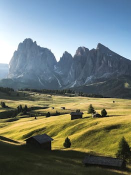 Stunning view of rolling hills and majestic peaks at Seiser Alm, perfect for nature lovers.