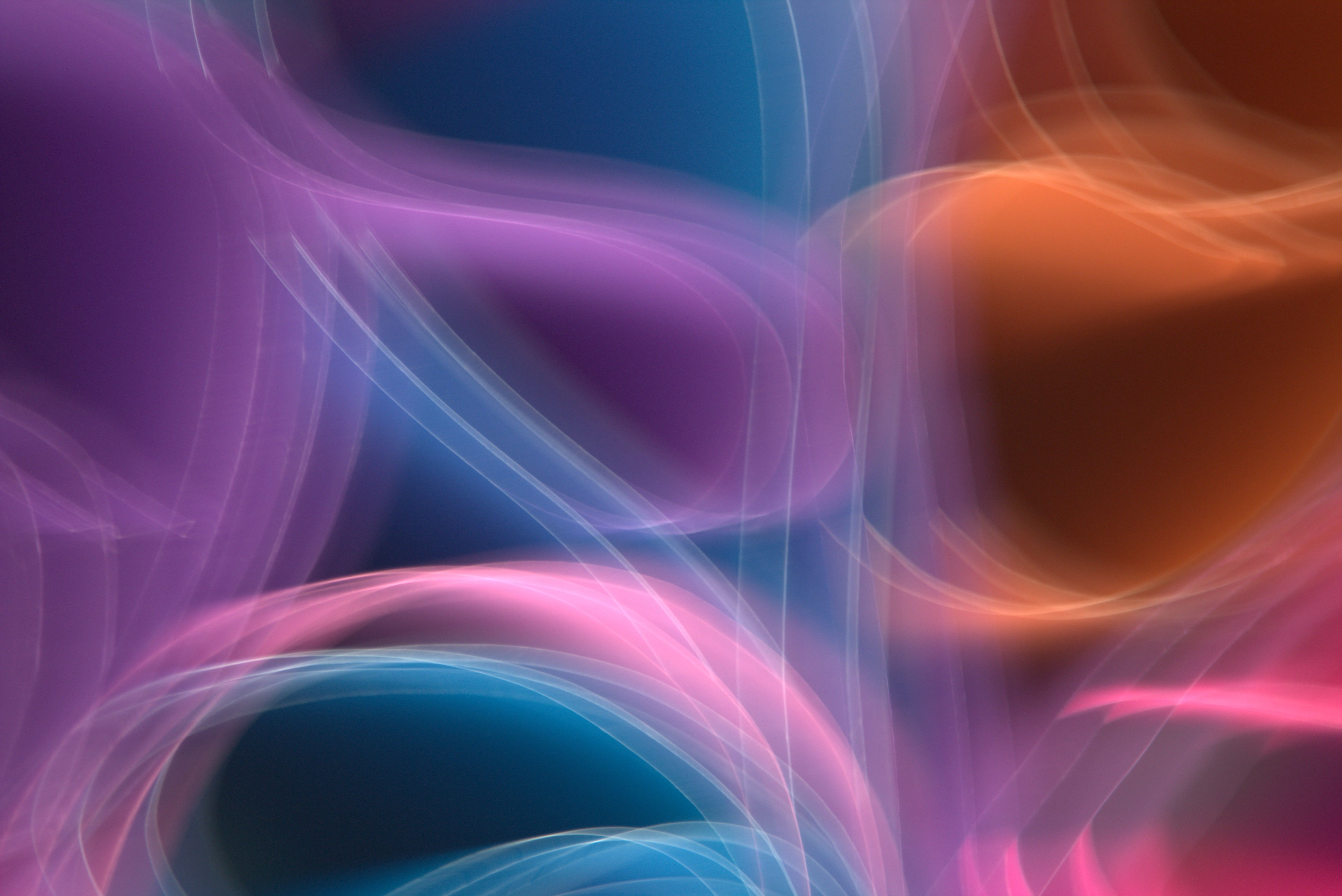 Vibrant abstract light trails create a dynamic composition in this colorful digital artwork.