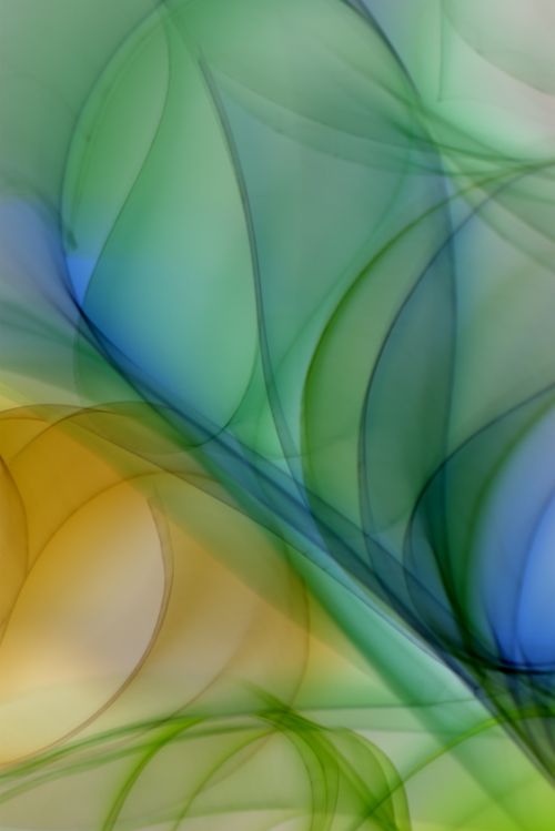 Free Vibrant abstract art featuring colorful fractal patterns in green, blue, and yellow hues, creating a dynamic visual effect. Stock Photo