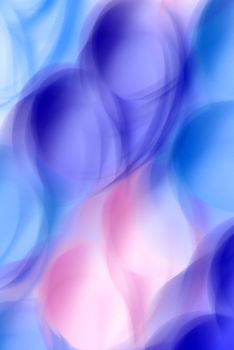 Vibrant abstract background with soft blue and pink bokeh shapes, perfect for a modern artistic touch.