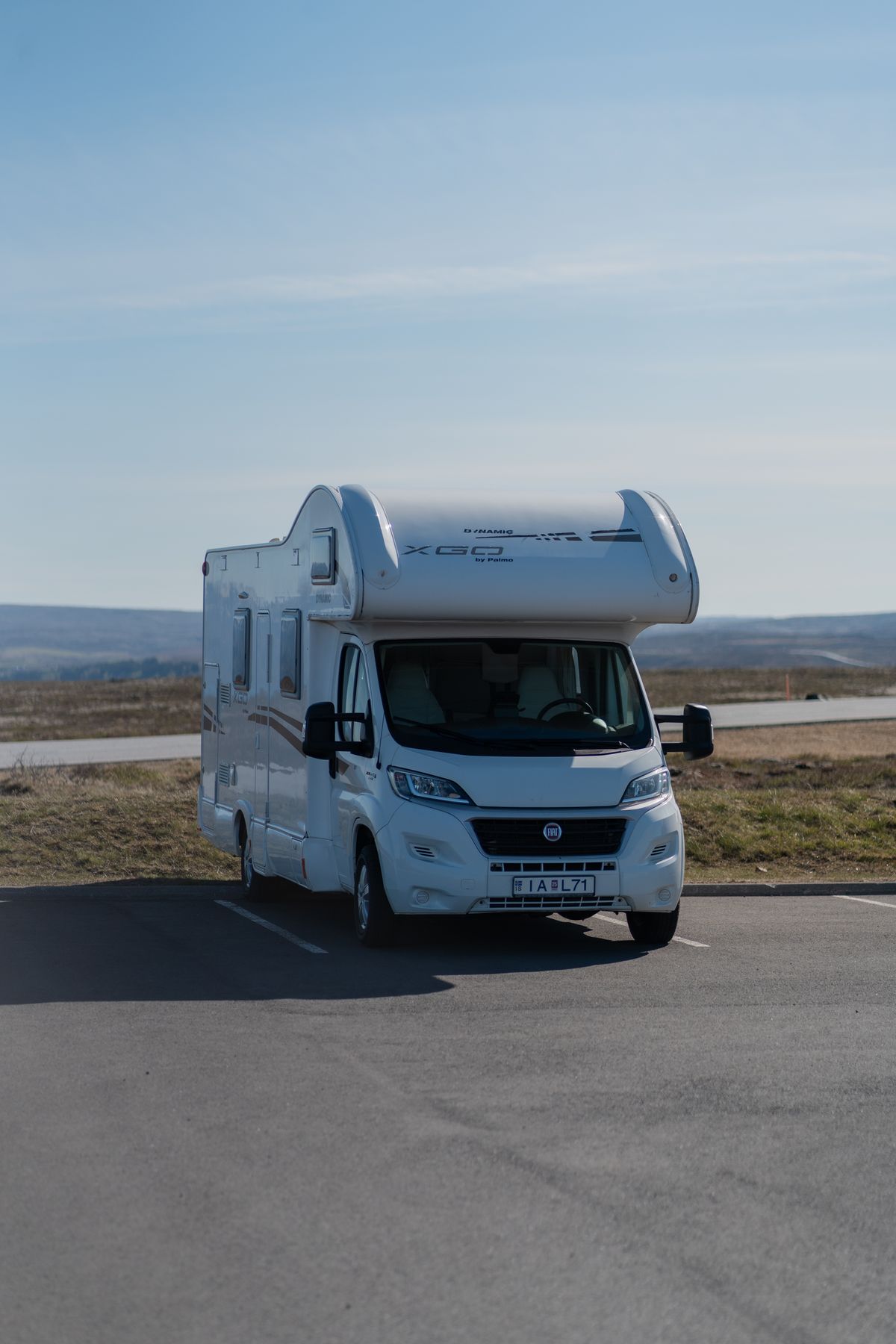 Sprinter camper van on a scenic road