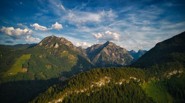 Breathtaking panorama of Sparberegg in Styria with clear skies and lush forests.