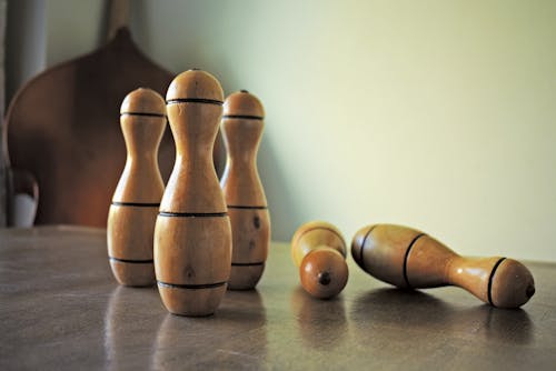 Brown Condiment Shakers on Table