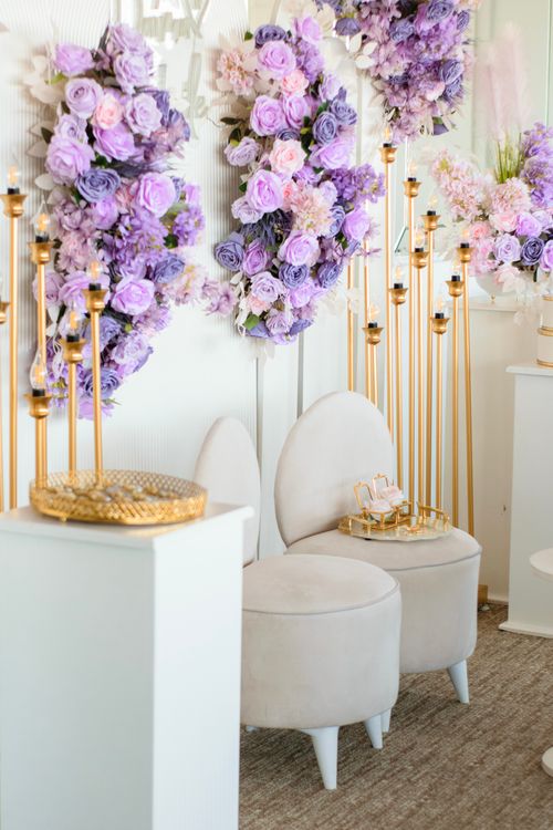 Free Luxury interior decor featuring elegant floral arrangements and chic furniture. Stock Photo