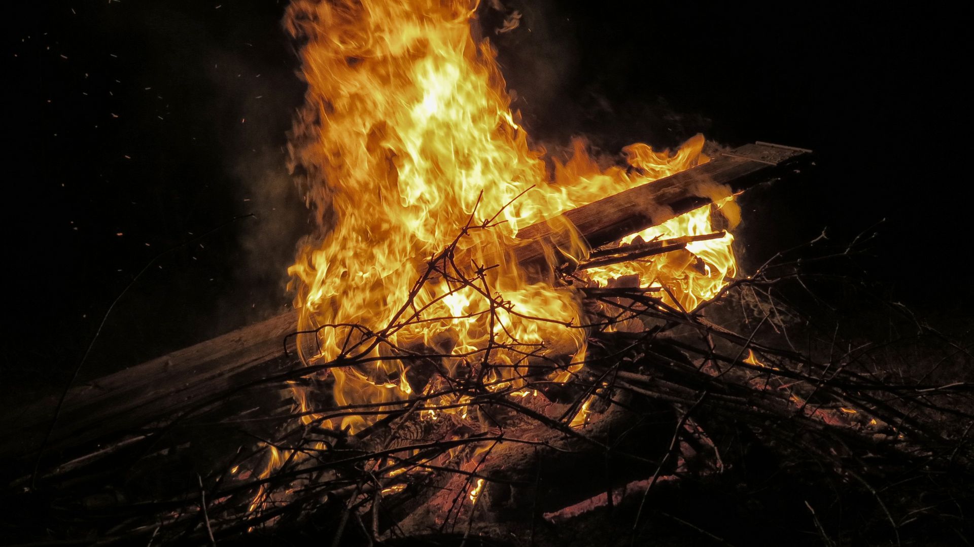 Burning Twigs and Wood Plank