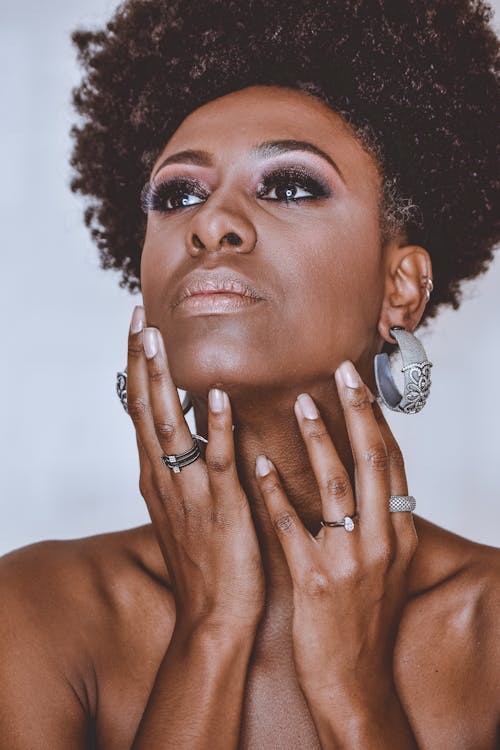 Photo of Woman Posing While Looking Away