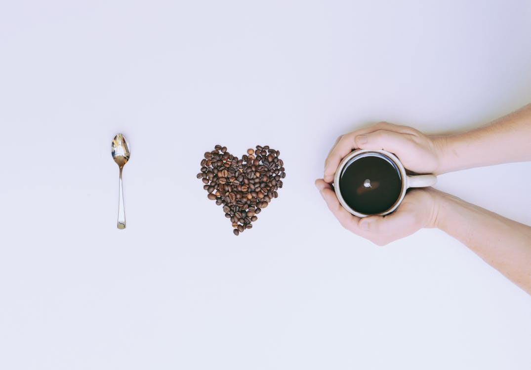 Free Flat Lay Photography of Mug and Coffee Bean Stock Photo