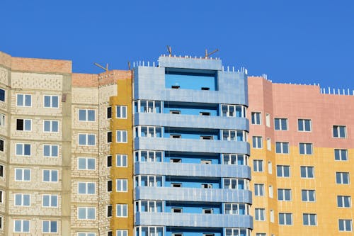 Ücretsiz Kahverengi Ve Mavi Yüksek Bina Stok Fotoğraflar