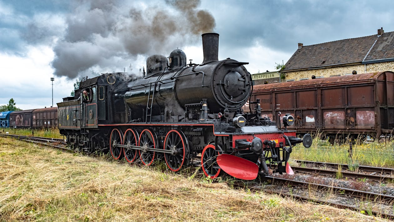 Photo of Train on Railroad Track