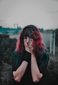 Shallow Focus Photo of Woman Wearing Black Top
