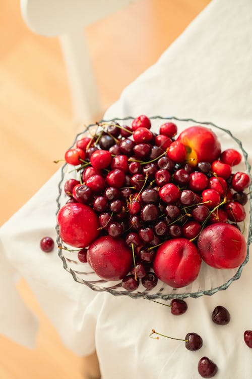 Photos gratuites de bol en verre, cerises, délicieux