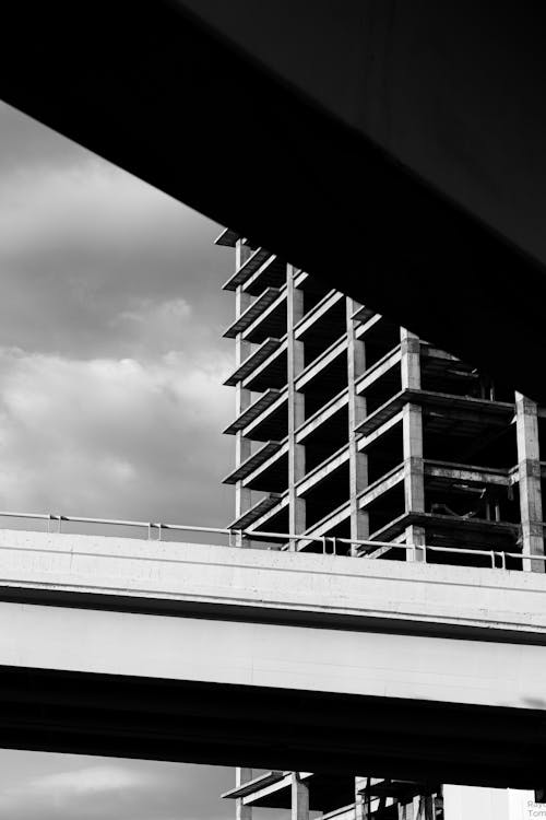 A black and white photo of a tall building