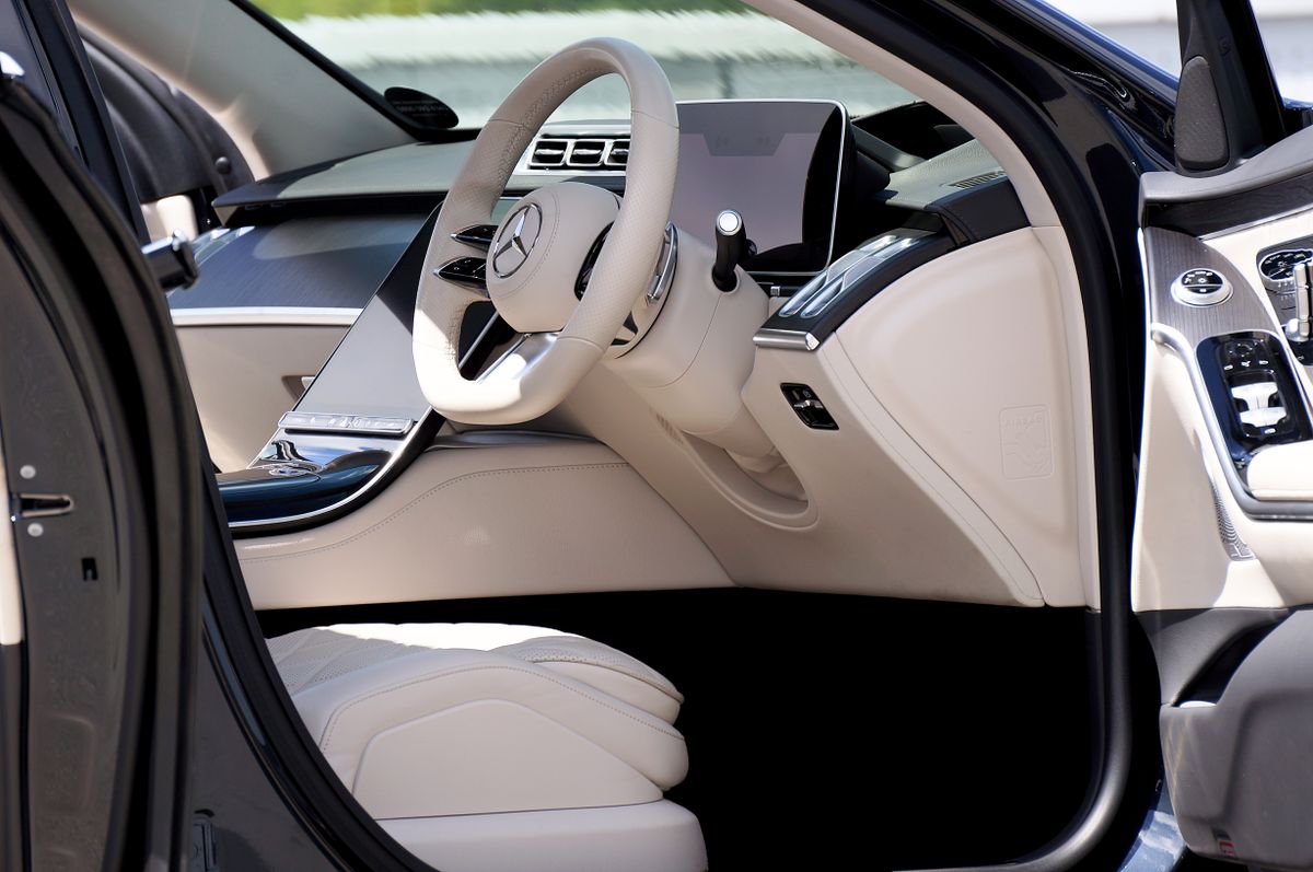 Modern premium car interior showing seats and dashboard detailing