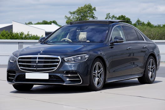 Photograph of a luxurious Mercedes-Benz S-Class car parked outdoors.